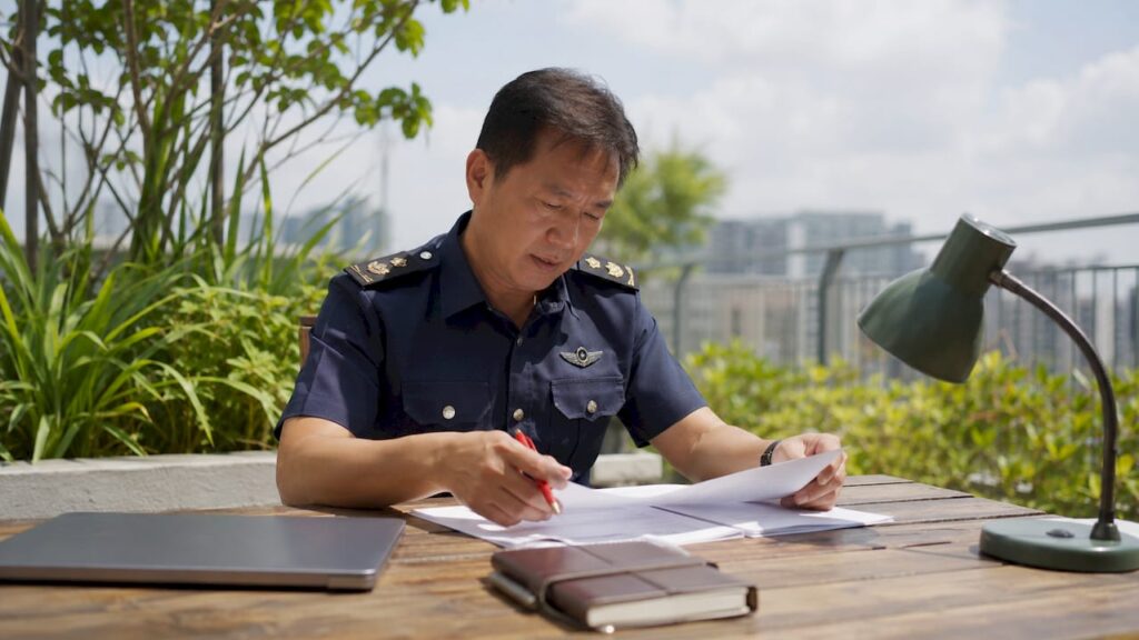 Fire safety officer reviewing compliance documents
