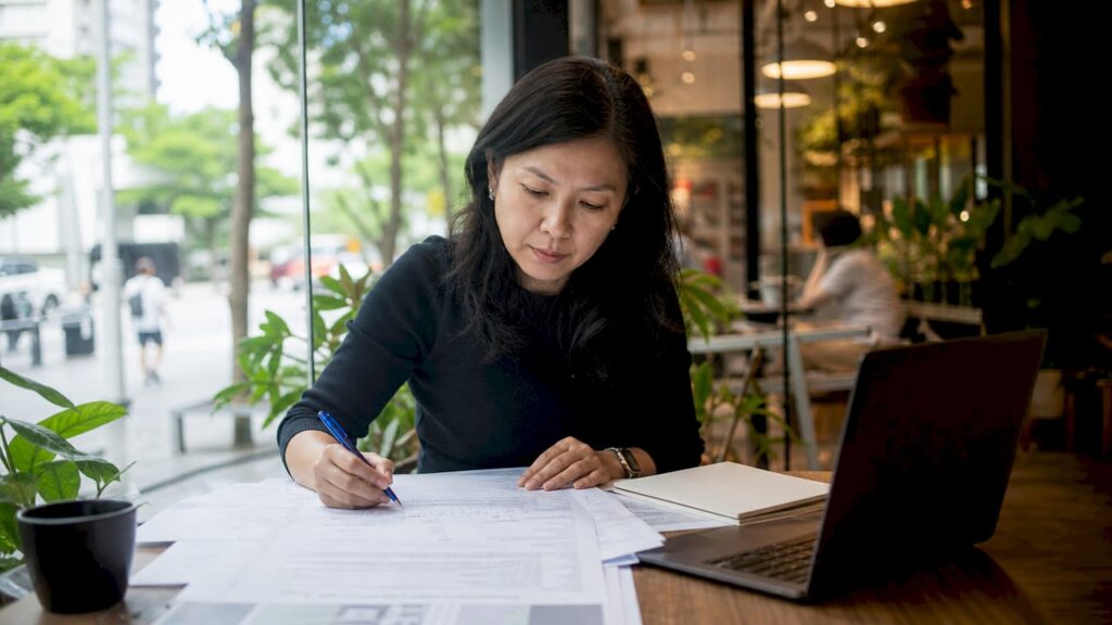 Engineer reviewing LTA project approval documents