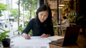 Engineer reviewing LTA project approval documents