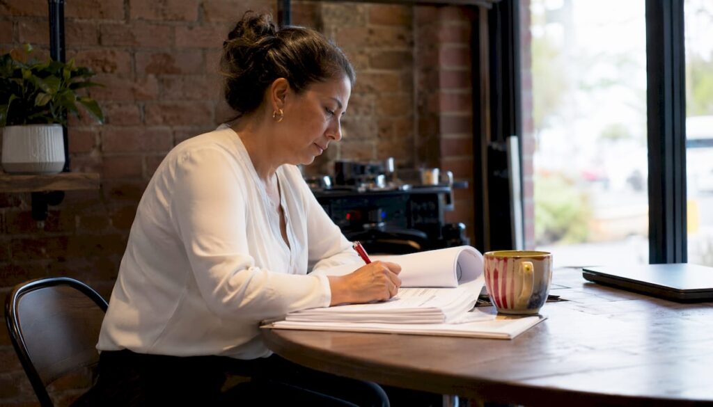 Project manager reviewing construction permit documents