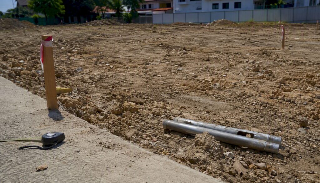 Singapore urban construction land with survey tools