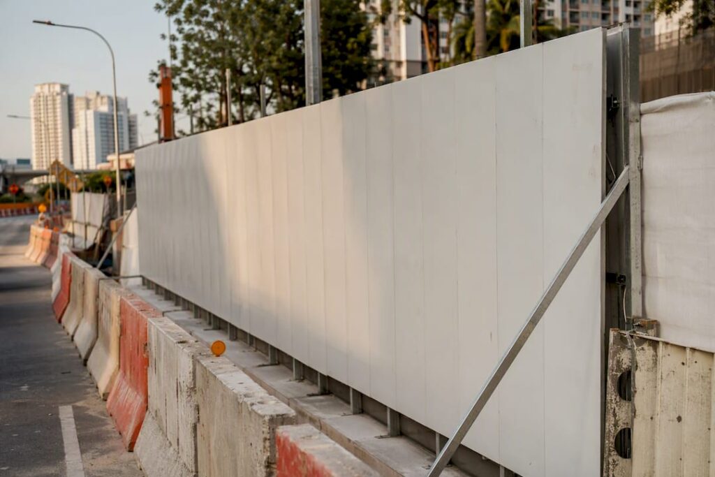 Construction hoarding panel on site