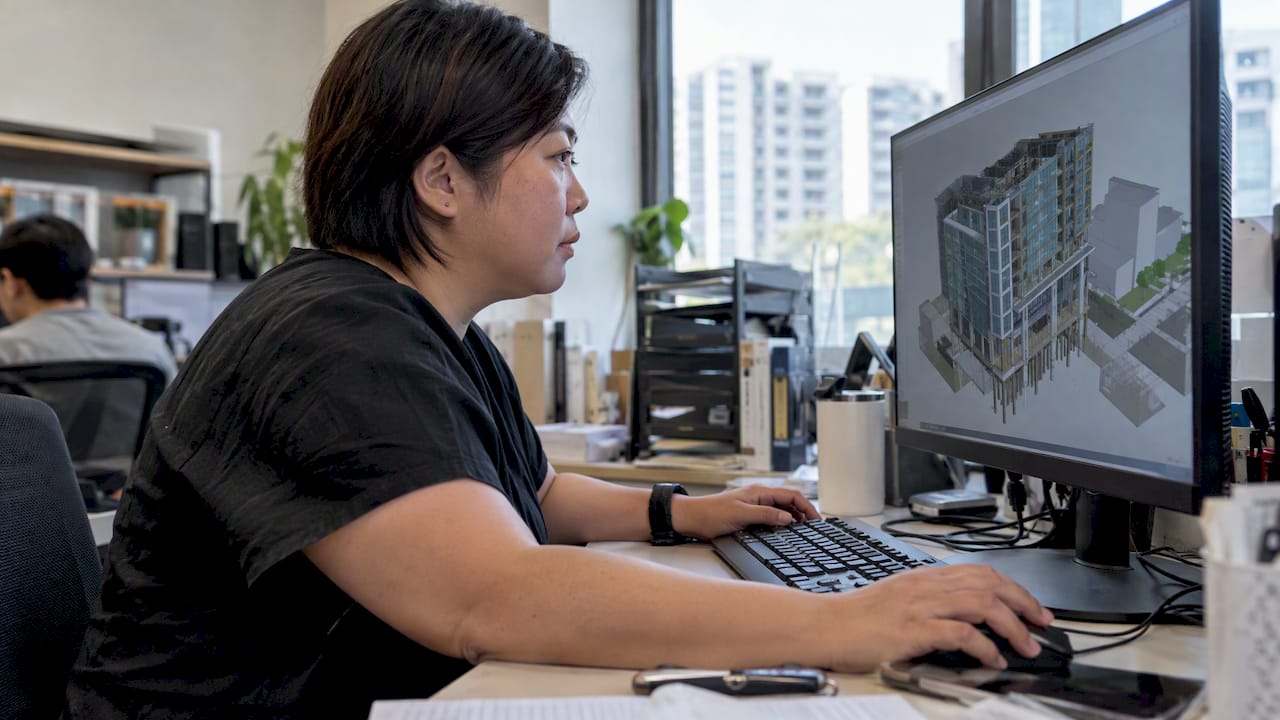 BIM coordinator checking a building model