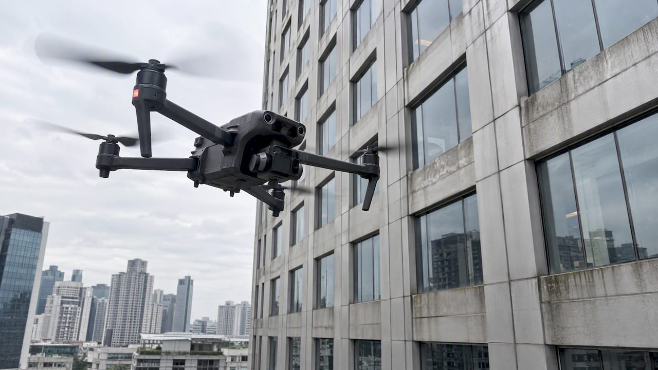 Drone surveying a Singapore tower façade