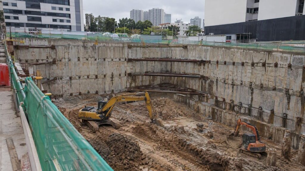 Basement excavation with retaining wall